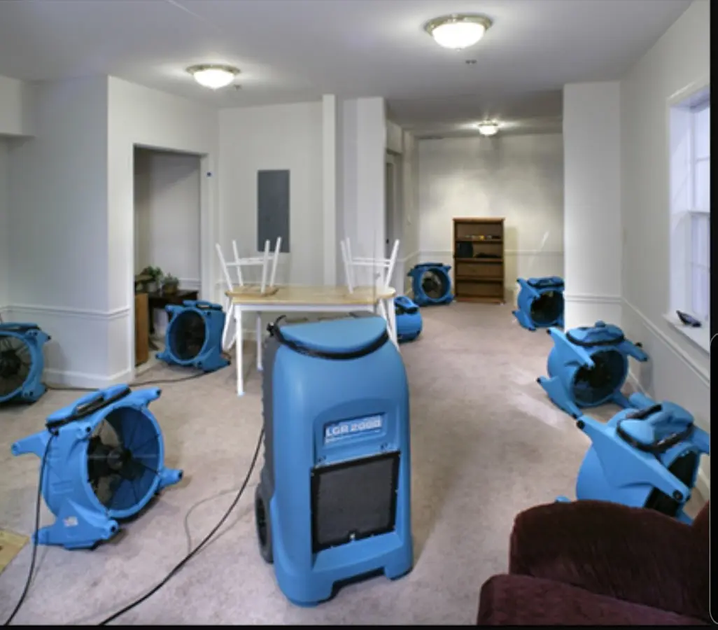 Air movers and dehumidifier setup for Water Damage Restoration in World Golf Village